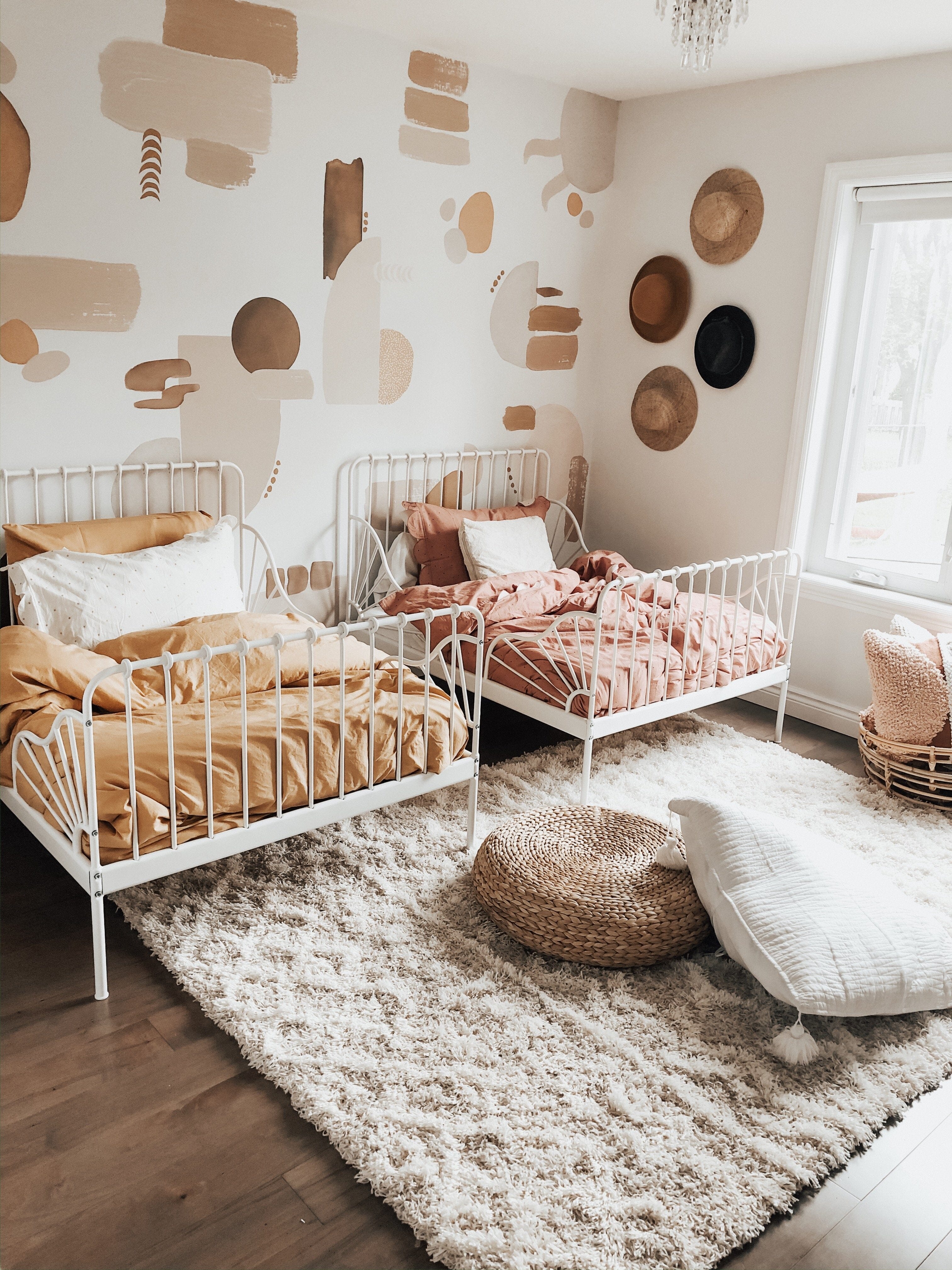 A Shared Girls Bedroom Featuring Abstract Wall Decals