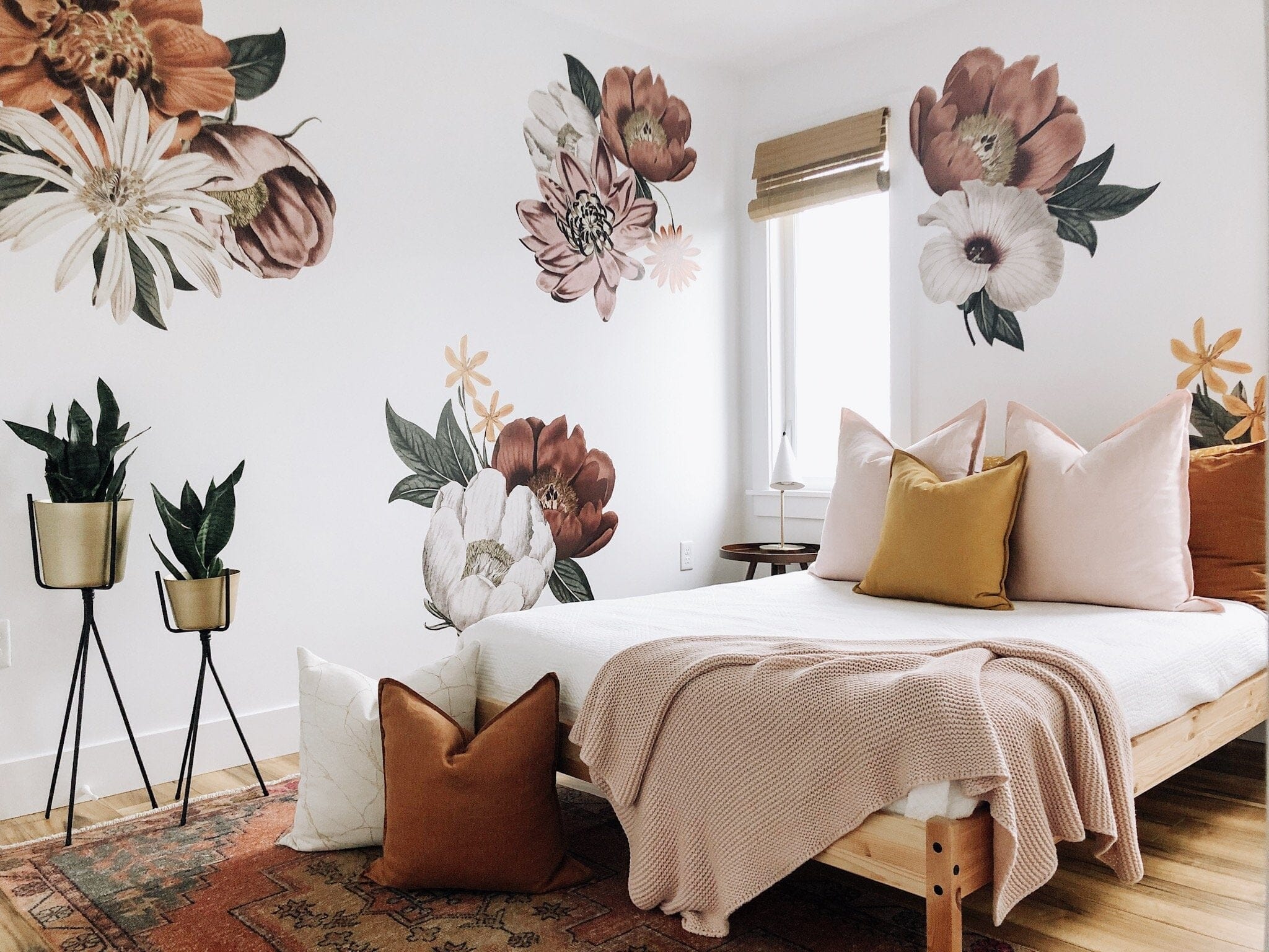 Bohemian Floral Wall Decals for a Warm and Layered Bedroom